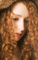 Young Woman With Red Hair Looking Sad Usa