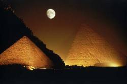 Moon Over Pyramids Of Giza At Night In Egypt