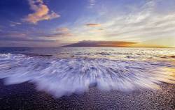 Sunset On Maui , Hawaii Beach With Molokai In Background .