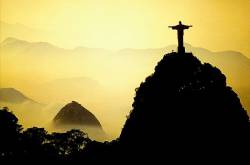 Rio De Janeiro Brazil Christ The Redeemer Statue , With Sugarloaf Mountain And Guanabara Bay In The Background
