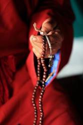 Nepali Sherpa Man In Traditional Lama Dress With Prayer Mala In The Hills Nepal Himalaya