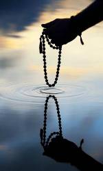 Japa Mala On Still Pond Portrait
