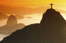 Christ , The Redeemer Statue , Rio De Janeiro , Brazil . Sugar Loaf Mountain In The Background . Brazil Landmarks .