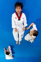 Boys Having A Rest During Their Taekwondo Training Class At The BoTao Taekwondo School In The Chaoyang Gymnasium , Beijing , China
