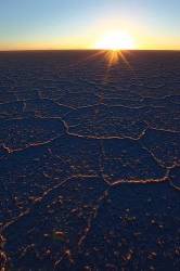 Hexagonal Salt Formations On Surface Of Salar De Uyuni At Sunrise , Bolivia
