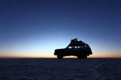 Toyota Land Cruiser Silhouetted Against Pre Dawn Sky , Salar De Uyuni , Bolivia