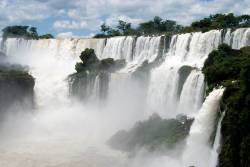 Wide Shot Of Some Of The Many Powerful Awe Inspiring Waterfalls At Iguacu Falls , Argentina / Brazil