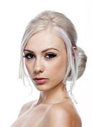 Pretty Young Woman With Blond Hair Against A White Background