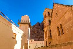 St Catherines Monastery , Sinai Peninsula , Lies At The Foot Of Modern Mount Sinai In Saint Catherine At An Elevation Of 1550 Meters . This Greek Orthodox Monastery Is A UNESCO World Heritage Site . The Official Name Of The Monastery Is Sacred Monastery Of The God Trodden Mount Sinai , And It Was Built Between 548 And 565 . This Is Also The Site Where Moses Is Supposed To Have Seen The Burning Bush .