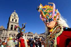 China Supay Female Devil Diablada Dancer Passing San Francisco Church During Gran Poder Festival , La Paz , Bolivia
