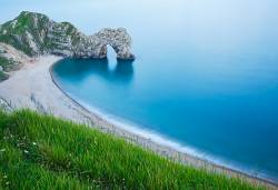 Evening View Of Durdle Door Beach , Dorset , England . Durdle Door Is One Of The Many Stunning Locations To Visit On The Jurassic Coast In Southern England .