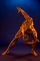 Bodybuilder Flexing Muscles
