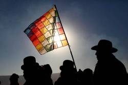 Aymara People Holding Wiphala Flag At Sunrise During Aymara New Year / June 21st Winter Solstice Celebrations , Tiwanaku , Bolivia