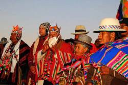 Aymara Shamans Or Amautas Waiting For Sunrise During Aymara New Year / June 21st Winter Solstice Celebrations , Tiwanaku , Bolivia