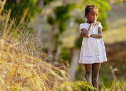 Haitian Little Girl And Poverty And Seeking Food From Mining Camp - This Little Girl Came To The Drill Site After Walking A Mile From Haiti , The Canadians There Brought Her Family Clothes , Food And Regularly Donated To The Family . On This Day , I Happen To Be There On-site As She Ever So Carefully Proceeded Forward Coming Around The Hill . I Was Surprised , As I Wasnt Expecting To See This On A Minesite .