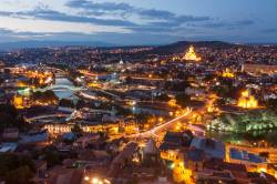 Overview Of The Historical Center Of Tibilisi At Dusk . Georgia