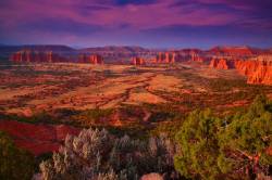 Sunset Over The Monuments Of Upper Cathedral Valley In Capital Reef National Park In Utah
