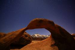Stars And Lone Pine Peak Through The Mobious Natural Arch In The Alabama Hills In The Alabama Hills Recreation Area Of California