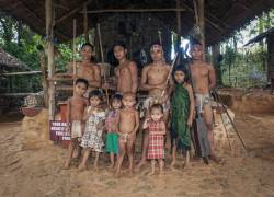 A Group Of Men, Teens And Children Of The Palawanos Tribe, Indigenous People Of Palawan Island, Put On A Display Of Their Culture At The Palawan Eco Garden And Tribal Display In Puerto Princesa, Palawan Island, Philippines.