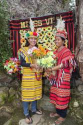 Two Filipino Tourists To Mines View Park Are Dressed In Traditional Ifugao Native Costume In Baguio City, Luzon Island, Philippines.