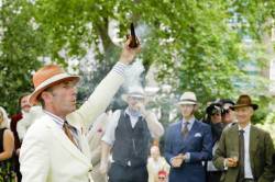 Gustav Temple Holds Aloft The Official Olympic Pipe At The Opening Ceremony Of The Chap Olympiad.