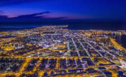 Top View Of Roads, Homes, Buildings At Twilight, Wintertime, Reykjavik, Iceland. This Image Is Shot With A Drone.