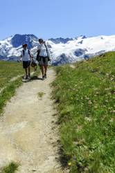 Mother And His Sun Trekking At Plateau Emparis And Showing Something To Him, Alps, France
