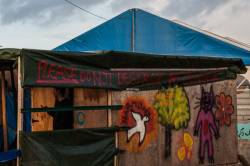 "Please Do Not Destroy The Jungle": One Of The Messages Written On The Wall Of One Of The Commerce In The Calais Jungle.