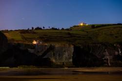 Night View Of Zumaia (Vasque Contry) Beach Under The Full Moon Light. This Is One Of The Places In Spain Where The Seventh Season Of Game Of Thrones Is Currently Been Filmed.