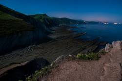 Night View Of Zumaia (Vasque Contry) Coast Under The Full Moon Light. This Is One Of The Places In Spain Where The Seventh Season Of Game Of Thrones Is Currently Been Filmed.