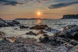 Sunset Over Rocky Beach
