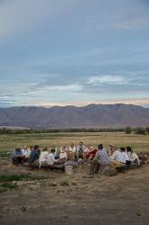 Elberta, Utah - Mormon High School Students Wearing Pioneer Clothing, Accompanied By Adult Leaders, Participate In A Three-day Handcart Trek, Recreating The Experience Of Mormon Emigrants Who Used Handcarts To Travel To Utah In The Late 1850s. At The End Of The Second Day, A Group Discussed The Day’s Events.