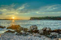 Sunset Over Rocky Beach