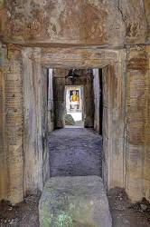 The Buddha Is Visible From Passageways Leading In All Directions At The Wat Nokor Bachey Temple Near Kampor Cham, Cambodia