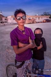 A Young Boy Emulates His Older Brother By Playing The Tough Guy At Bogo City, Cebu Island, Philippines.