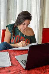 Young Woman Taking Notes