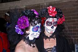 Women Wearing Day Of The Dead Skull Makeup At Halsted Street Halloween Parade.  Chicago