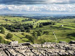 View Over Malhamdale From Malham Cove Near Malham Yorkshire Dales England