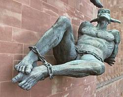 A Detail From The Statue Of Saint Michael Defeating Satan On The Side Of The New Coventry Cathedral