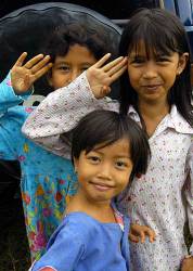 Alue Bilie , Sumatra , Indonesia ( Jan 19 , 2005 ) Young Girls Salute In Their Best Form For A Photo Taken At One Of The Camps Located In The Town Of Alue Bilie , Aceh , For Civilians Displaced By The Dec 26 Tsunami Teams From The United Nations ( Un ) And The World Health Organization ( Who ) , Currently Aboard Uss Abraham Lincoln ( Cvn 72 ) , Are Conducting Surveys In The Region Of Aceh , Sumatra To Determine The Needs Of The Victims Of The Tsunami That Struck Southeast Asia The Abraham Lincoln Carrier Strike Group ( Csg ) Is Currently Operating In The Indian Ocean Off The Coast Of Indonesia And Thailand In Support Of Operation Unified Assistance Us Navy Photo By Photographers Mate 2nd Class Elizabeth A Edwards ( Released )