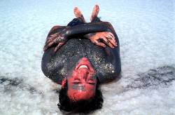 Man Covered With Mud In The Dead Sea , Israel