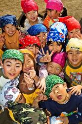 Japanese Elementary School Students Crowd Each Other To Get In Front Of The Camera In Ichinoseki , Iwate , Japan
