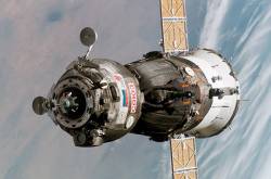 Back Dropped By A Blue And White Earth , This Close Up View Features The Soyuz TMA 6 Spacecraft Approaching The International Space Station ( ISS ) Onboard The Spacecraft Are Cosmonaut Sergei K Krikalev , Expedition 11 Commander Representing Russias Federal Space Agency Astronaut John L Phillips , NASA ISS Science Officer And Flight Engineer And European Space Agency ( ESA ) Astronaut Roberto Vittori Of Italy The Soyuz Linked To The Pirs Docking Compartment At 9 : 20 P M ( CDT ) On April 16 , 2005 As The Two Spacecraft Flew Over Eastern Asia The Docking Followed Fridays Launch From The Baikonur Cosmodrome In Kazakhstan ( 16 April 2025 )