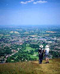 Couple Looking At View Looking North From North Hill Malvern Hills Worcestershire