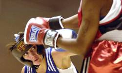 SAN ANTONIO ( AFPN ) Celsa Reyes Connects With A Body Shot Jab To Emma Atolagbe Reyes Won By Decision Jan 20 Reyes Is From F E Warren Air Force Base , Wyo , And Atolagbe Is From Langley AFB , Va Both Will Represent The Air Force At The Armed Forces Boxing Tournament At Fort Huachuca , Ariz , Feb 6 To 11