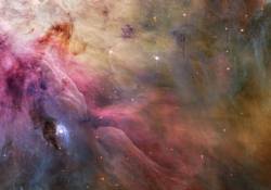 This Esthetic Close Up Of Cosmic Clouds And Stellar Winds Features LL Orionis , Interacting With The Orion Nebula Flow Adrift In Orions Stellar Nursery And Still In Its Formative Years , Variable Star LL Orionis Produces A Wind More Energetic Than The Wind From Our Own Middle Aged Sun As The Fast Stellar Wind Runs Into Slow Moving Gas A Shock Front Is Formed , Analogous To The Bow Wave Of A Boat Moving Through Water Or A Plane Traveling At Supersonic Speed The Small , Arcing , Graceful Structure Just Above And Left Of Center Is LL Oris Cosmic Bow Shock , Measuring About Half A Light Year Across The Slower Gas Is Flowing Away From The Orion Nebulas Hot Central Star Cluster , The Trapezium , Located Off The Upper Left Corner Of The Picture In Three Dimensions , LL Oris Wrap Around Shock Front Is Shaped Like A Bowl That Appears Brightest When Viewed Along The " Bottom " Edge The Beautiful Picture Is Part Of A Large Mosaic View Of The Complex Stellar Nursery In Orion , Filled With A Myriad Of Fluid Shapes Associated With Star Formation